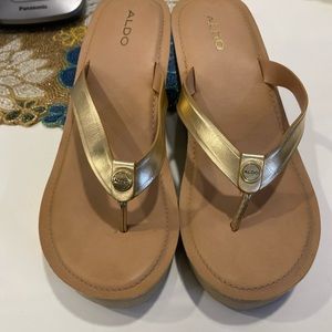 Gold V strap wedges